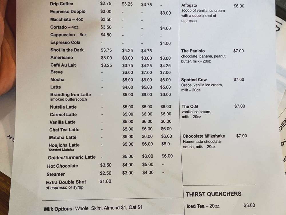 The hand-lettered Branding Iron menu board