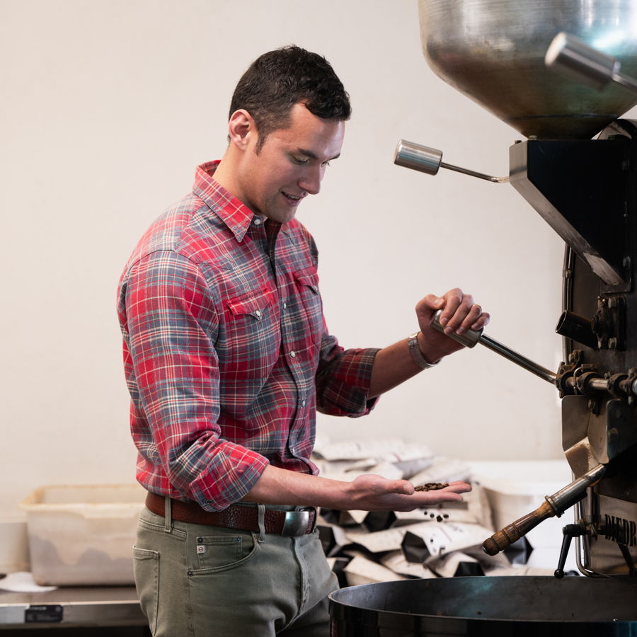 Working the roaster in a plaid shirt